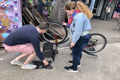 Dylan and Chloe fixing a bike